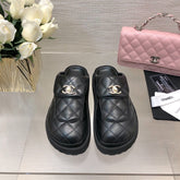 CC TURNLOCK FLAP MULES BLACK LAMBSKIN